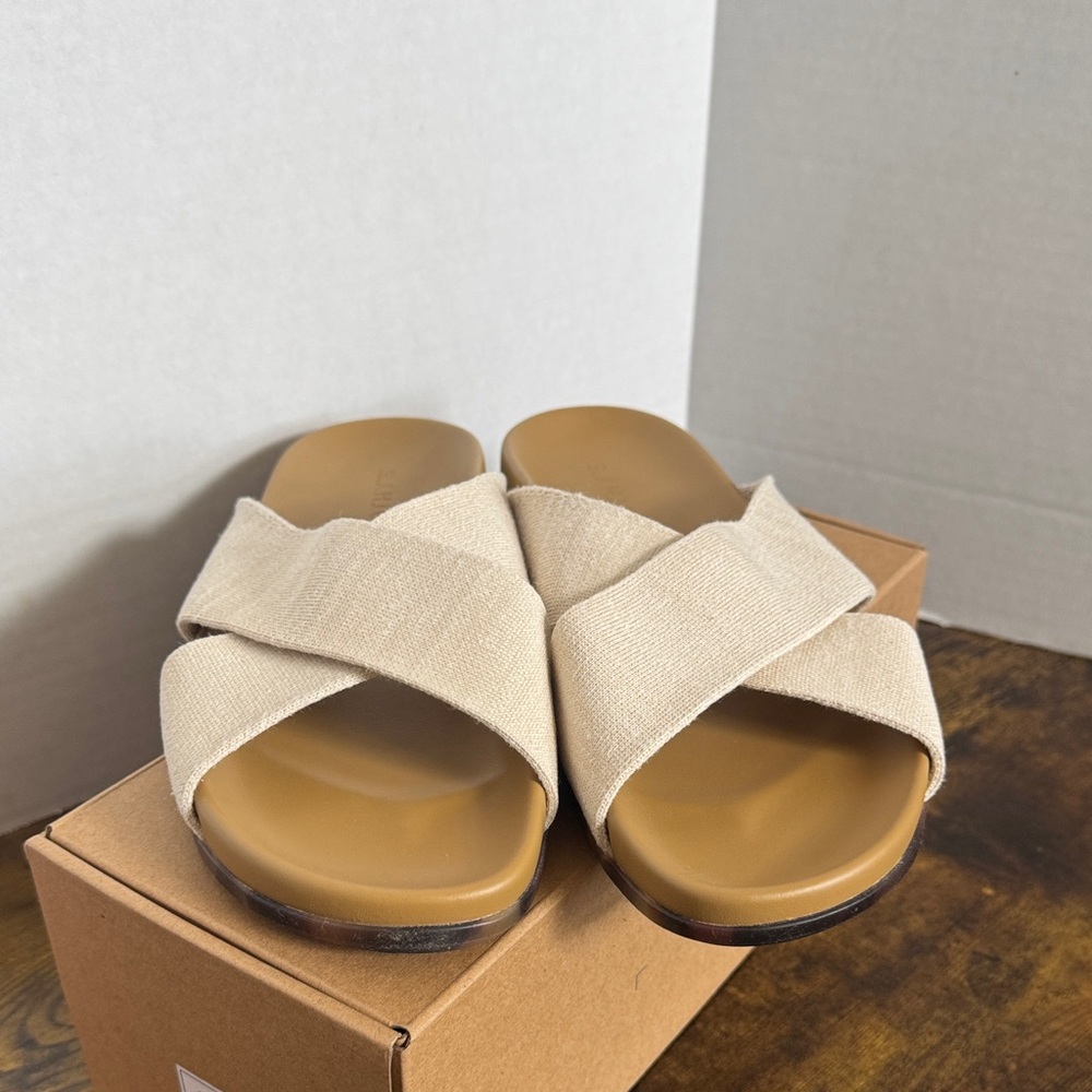 Rothy's Beige Cross-Strap Slide Sandals
New in box. Never worn